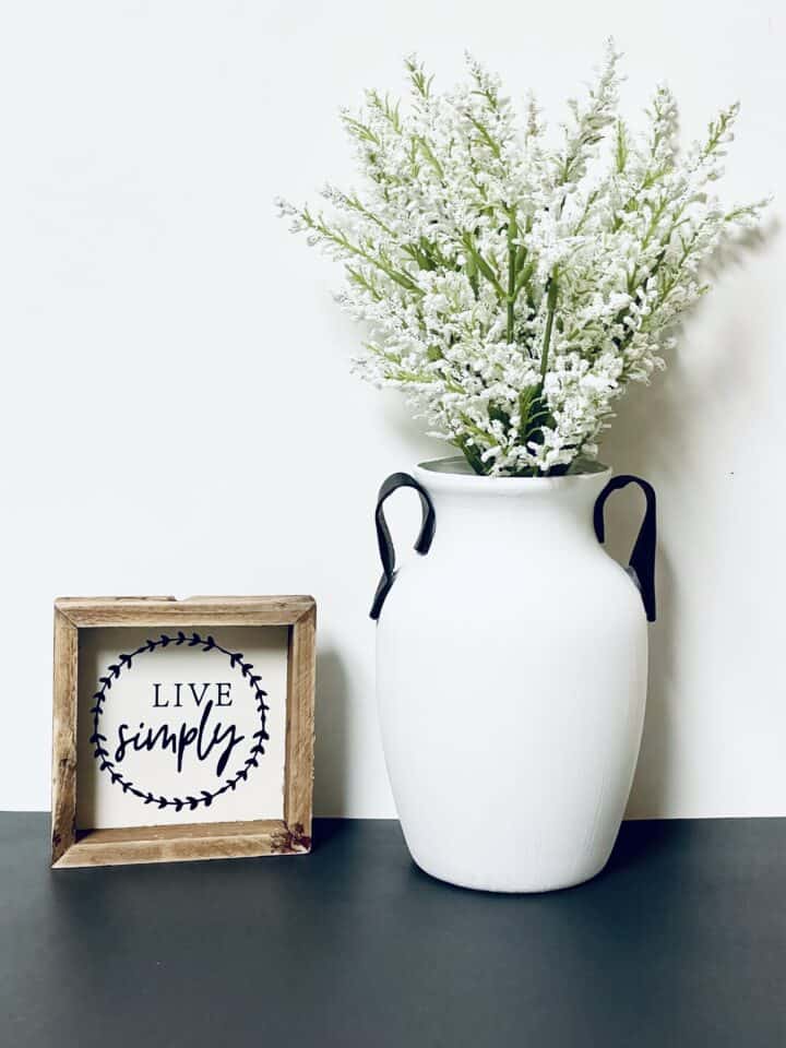 vase with flowers by live simply framed picture