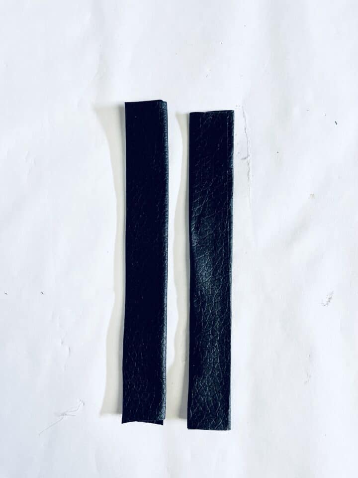 2 pieces of cut faux leather strips